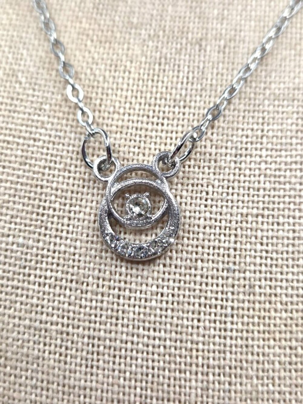 Silver Tone Circle Pendant Necklace With Clear Crystal Accents On Delicate Chain